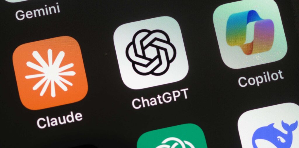 Close-up of smartphone screen displaying AI app icons including Gemini, Grok, Claude, and ChatGPT.